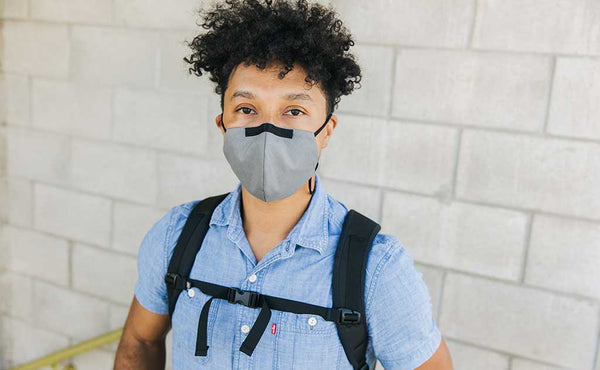 Person wearing the V5 Mask, True Grey, in size Medium/Large.